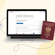 Planujesz podróż do Albanii? Sprawdź, czy do Albanii potrzebny jest paszport, przeglądając informacje na gov.pl. Obok laptopa leży polski paszport.